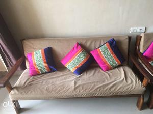 Teakwood solid sofa set with quality cushions.