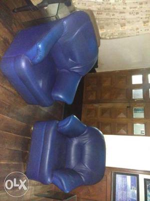 Two Blue Leather Rolled-arm Sofa Chairs