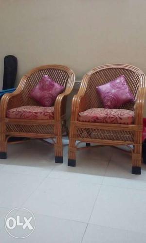 Two Brown Rattan Frame With Padded Chair