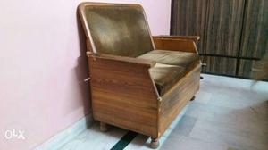 Two seater setty in good condition with storage