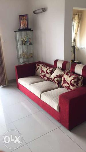 Two sets of sofa one 4 seater and one 3seater wooden with
