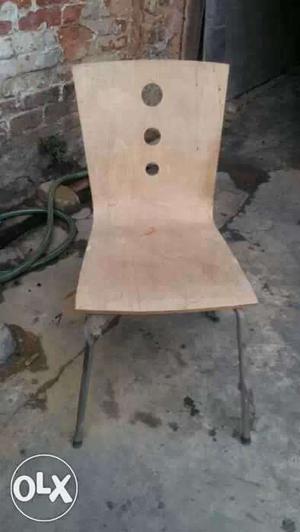 Wooden chair with steel base