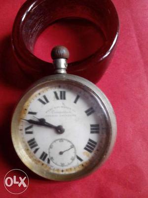 100 years old silver pocket watch of British