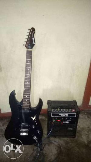 Givson electric guitar with amplifier. only few