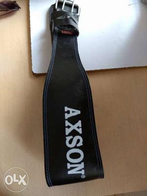 Unused axon weight lifting belt for back support.