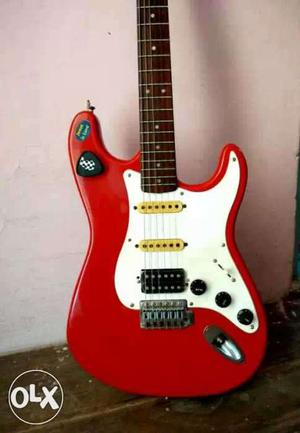 White And Red Stratocaster Electric Guitar