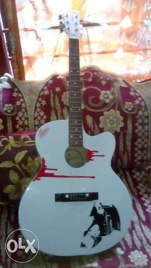 White, Black, And Red Single Cutaway Acoustic Guitar