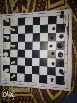Black And White Chess Board With Piece