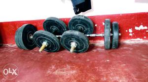 Black Barbell With Pair Of Dumbbells