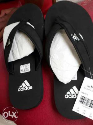 Black-and-white Adidas Flipflops