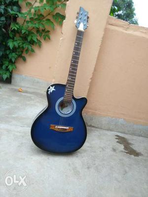 Blue And Black Sunburst Cutaway Acoustic Guitar