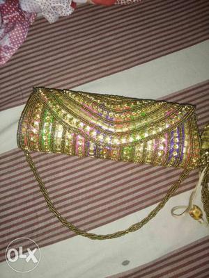 Gold, Green, And Purple Sling Bag