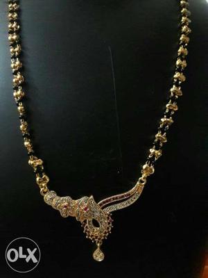 Gold With Black And Red Gemstone Neckalce