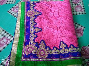Green, Blue And Pink Textile