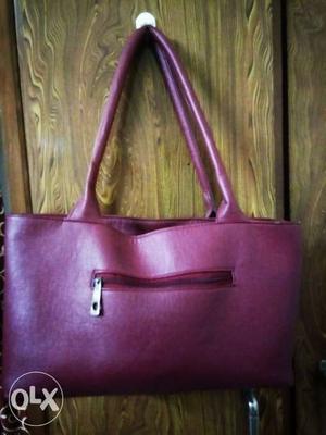 Hand Bag in Cherry color used only 2 months