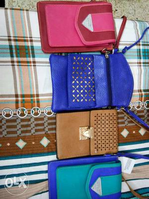 New mini sling purses.. 150 each v good condition