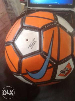 Orange, Black, And White Nike Soccer Ball