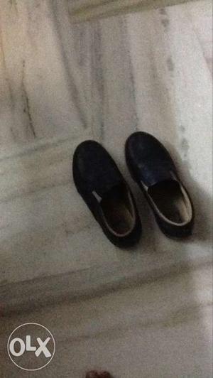 Pair Of Black Leather Slip-on Shoes