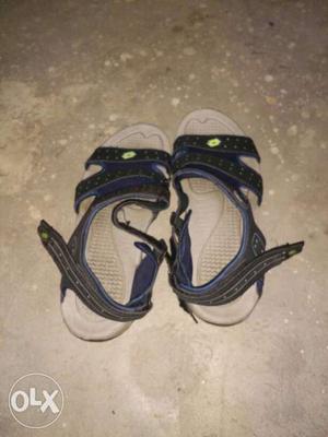 Pair Of Black Trek Sandals