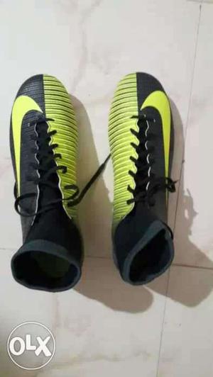 Pair Of Black-and-yellow Nike Shoes
