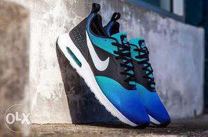 Pair Of Blue-teal-and-black Nike Low Top Sneakers