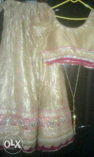 Party wear dress, golden lehenga withcontrasts