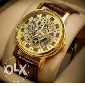 Round Gold Mechanical Watch With Brown Leather Band