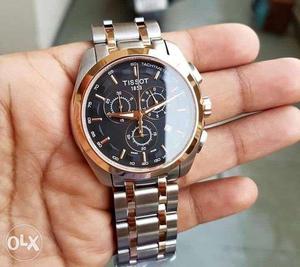 Round Gold Tissot Chronograph Watch With Silver And Gold