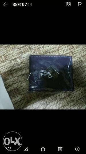 Seal pack mens wallet.purple color