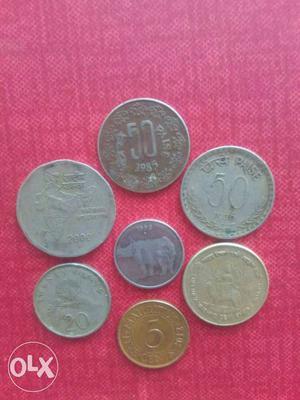 Seven Round Indian Coins