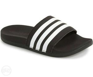 The Adidas slippers size  limited stock