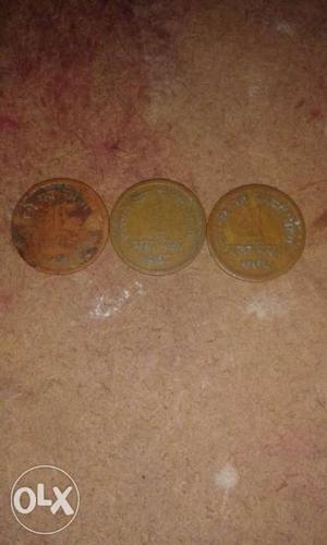 Three Round Brown Coins