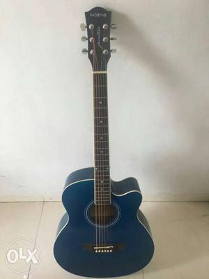 Unused acoustic guitar in mint condition.