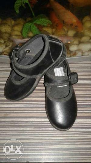 Used Black Leather school shoes for 2-4 years girls.