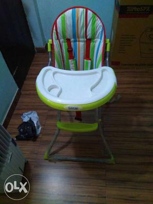 Baby's White And Green Feeding High-chair