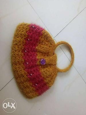 Golden and pink hand bag