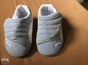 Three pair of new born baby shoes