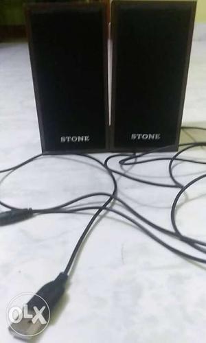 Two Black Stone Computer Speakers