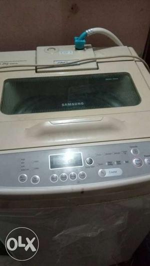 White Top Load Samsung Washing Machine