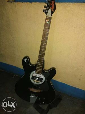 Black Washburn Cutaway Acoustic Guitar