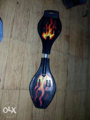 Black With Red Flame Print Caster Board 2 months of use no
