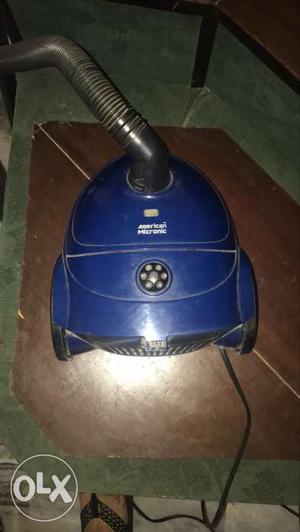 Blue And Black Canister Vacuum Cleaner