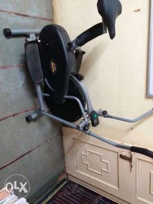 Gray And Black Elliptical Trainer Bicycle