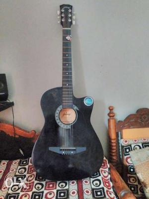 Jixing black acoustic guitar with extra strings 2