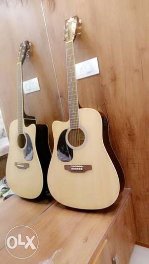 Semi acoustic guitar. wooden color. pluto