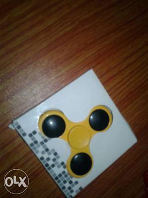 Yellow 3-bladed Fidget Spinner In Box