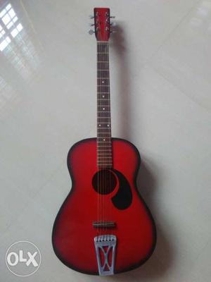 Acoustic guitar with extra strings,sticks,carry