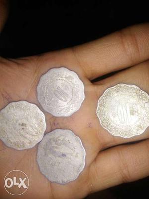 Four Scalloped Edge Round Silver Coins