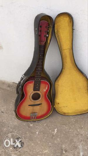 Old guitar suitable for beginners only