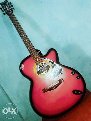 Pink And Black Acoustic Guitar